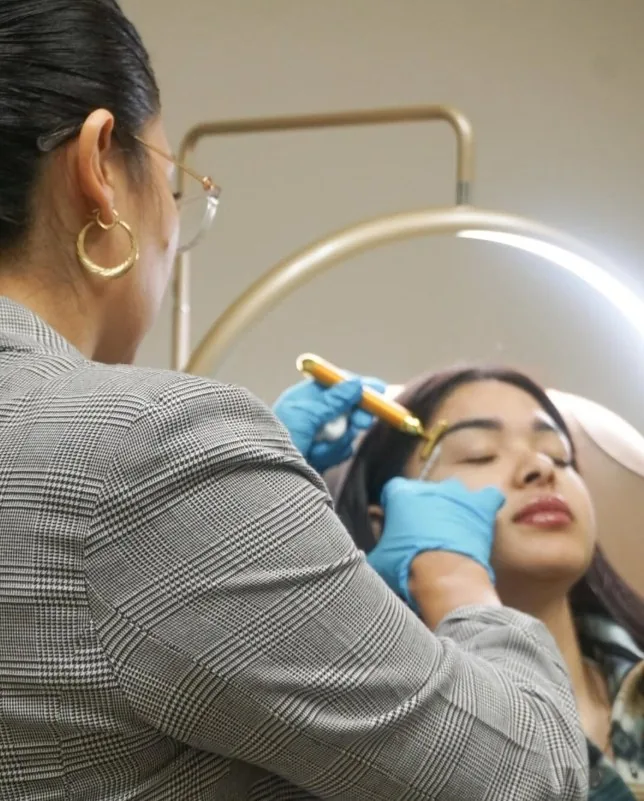 Brianna performing a treatment